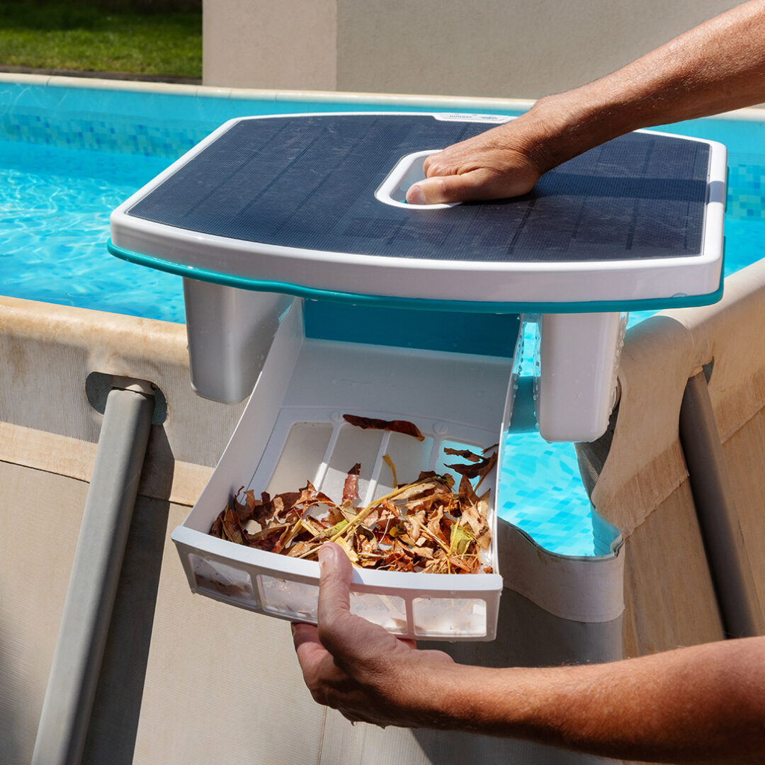 Maytronics Dolphin Skimmi Cordless Pool Skimmer debris collected in basket